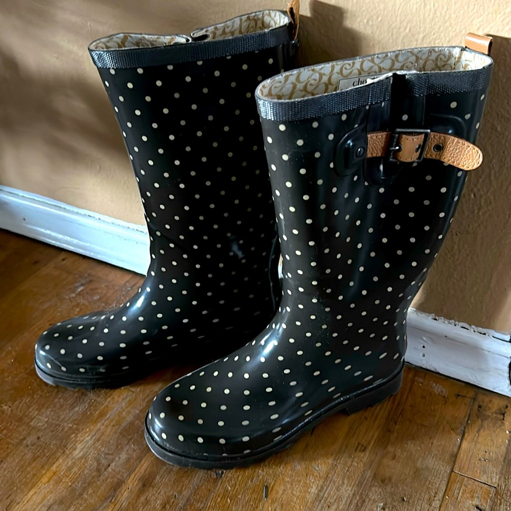 Brand new Chooka rain boots. Size 7. They are black with white polka dots.